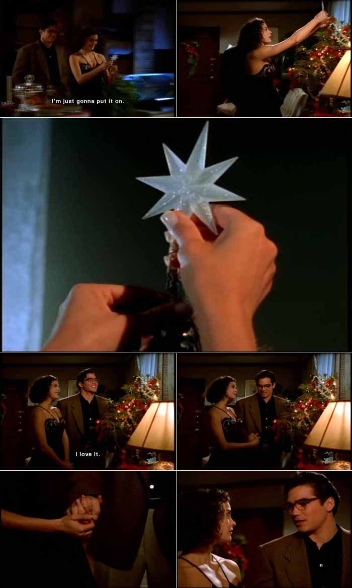 Lois Lane puts Clark's beautiful Star of Bethlehem gift on the top of her Christmas tree