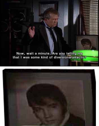 Elvis-worshipper Perry White stands in front of a framed photo of his idol
