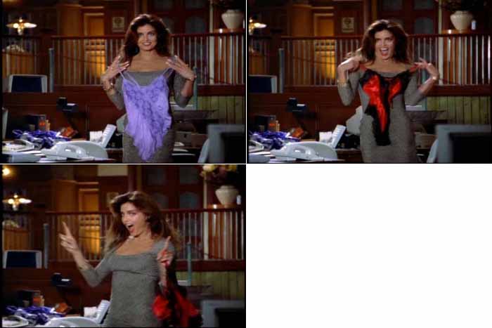 Cat Grant decides between a slinky blue camisole or red and black lingerie